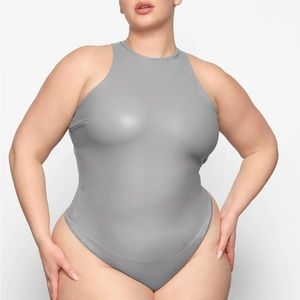 NWT FAUX LEATHER HIGH NECK BODYSUIT